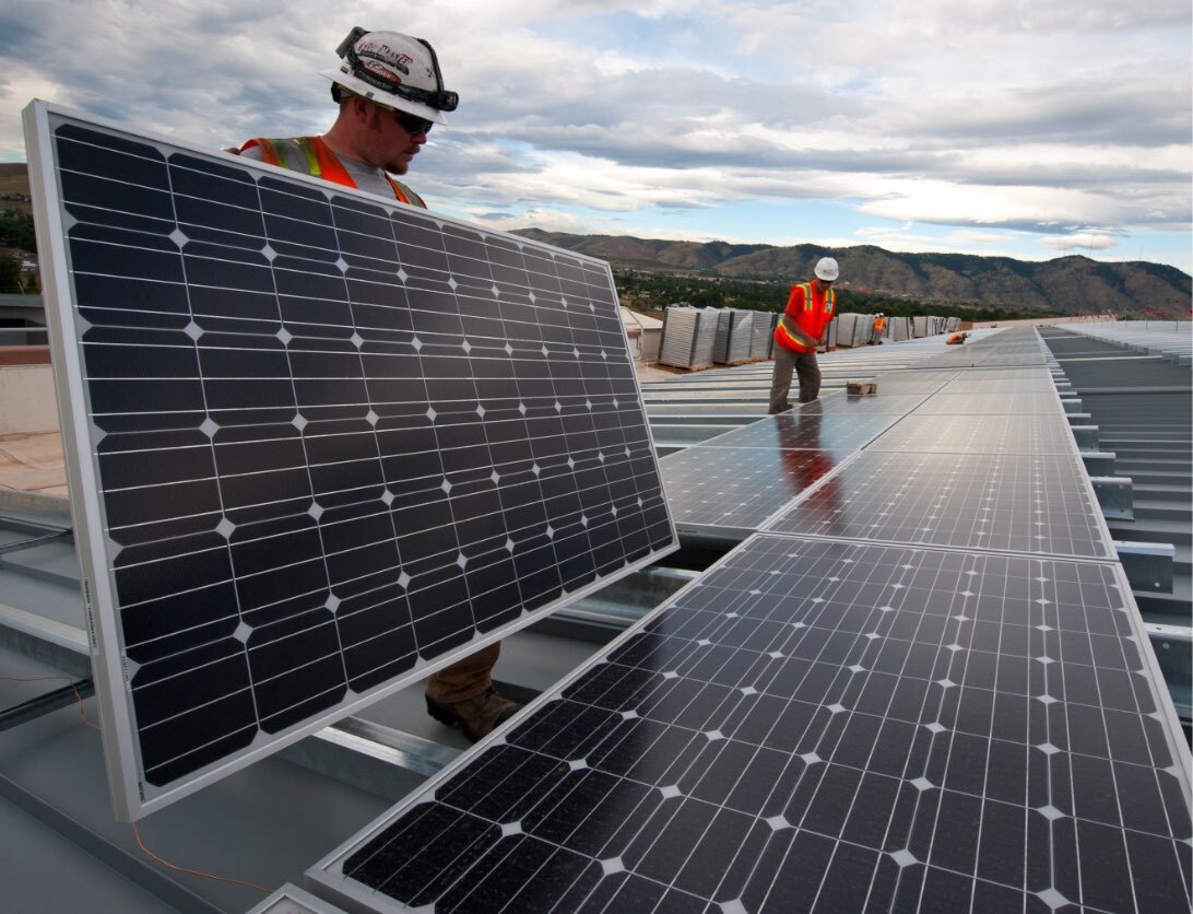 People Installing Solar Panels